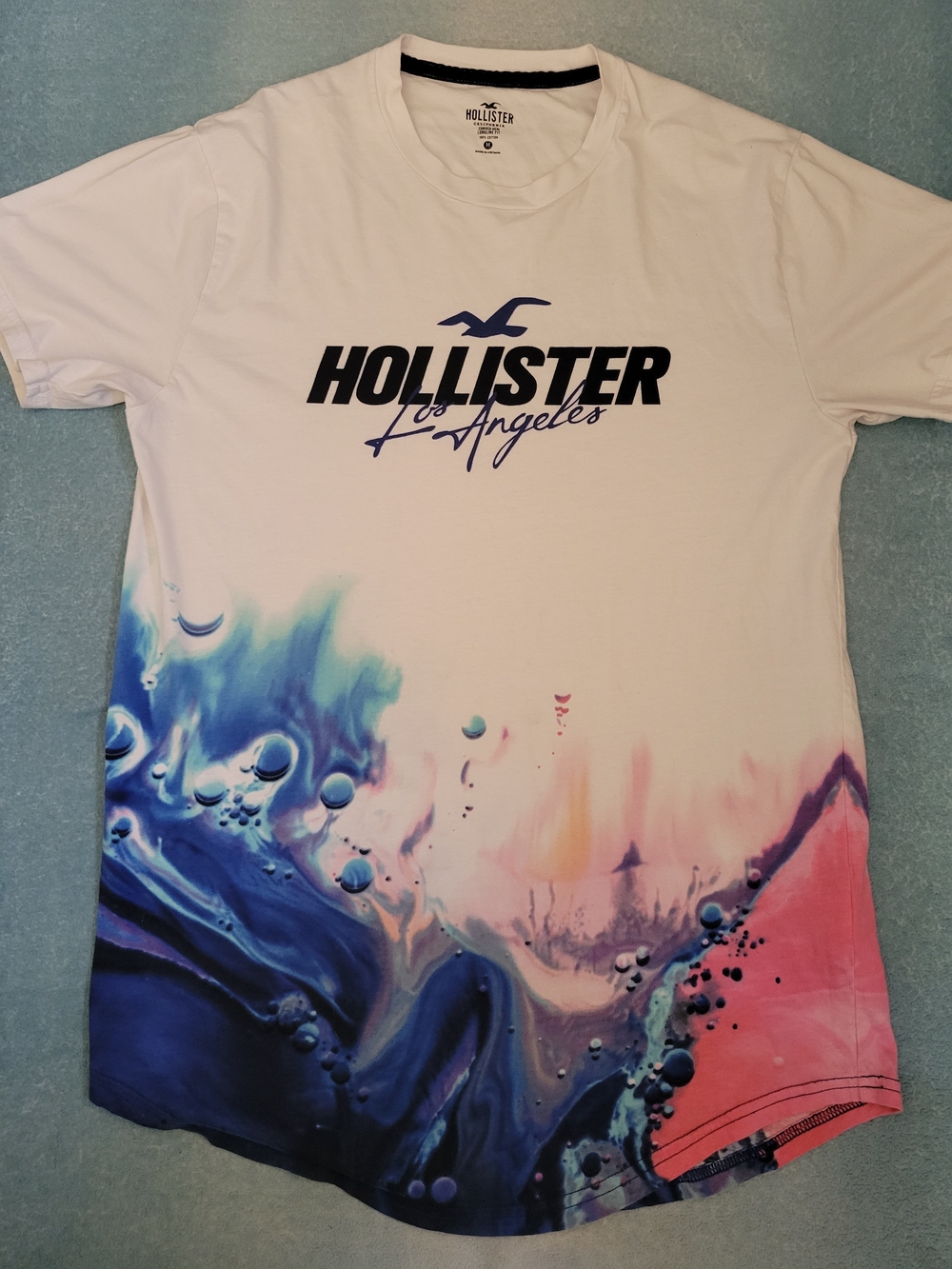 Hollister White Short-Sleeve Tee with Blue and Pink Wave Graphic